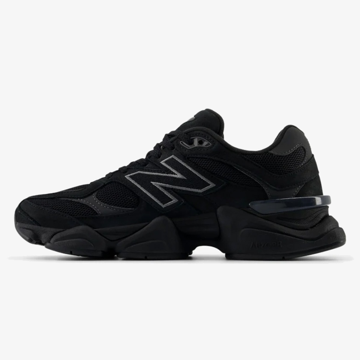 All-black NB 9060 sneaker with tonal overlays and sculpted chunky sole