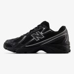 Black and silver NB 740v2 sneaker with mesh panels and metallic overlays