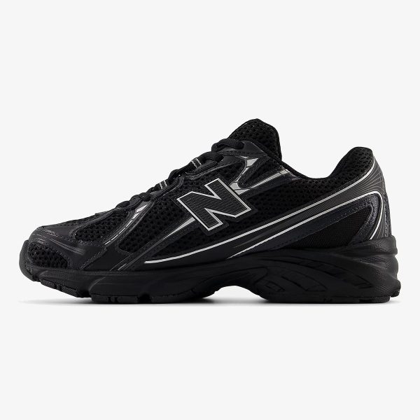 Black and silver NB 740v2 sneaker with mesh panels and metallic overlays