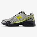 White, black, and yellow NB 740v2 sneaker with silver overlay details