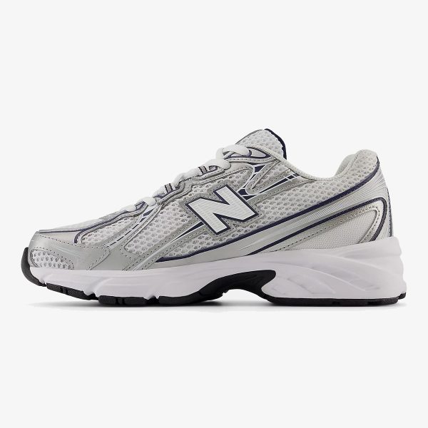 White and navy NB 740v2 sneaker with grey accents and black rubber outsole