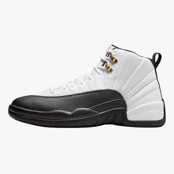 Jordan 12 Taxi sneaker with white leather, black overlays, and gold eyelets